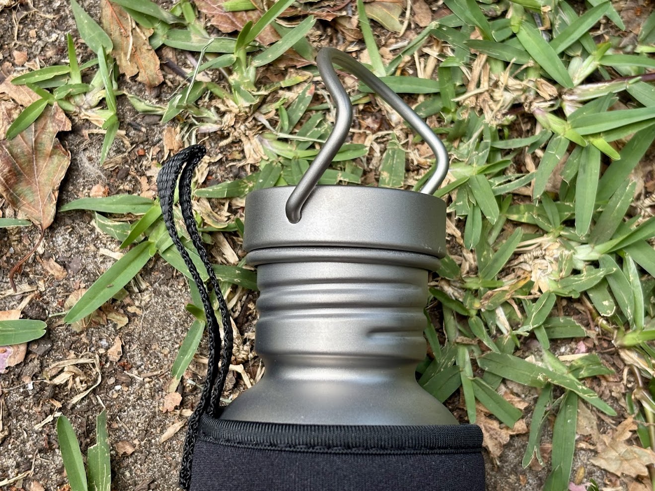The strong rotating titanium hook on the lid of this titanium bottle is great for clipping it to anything