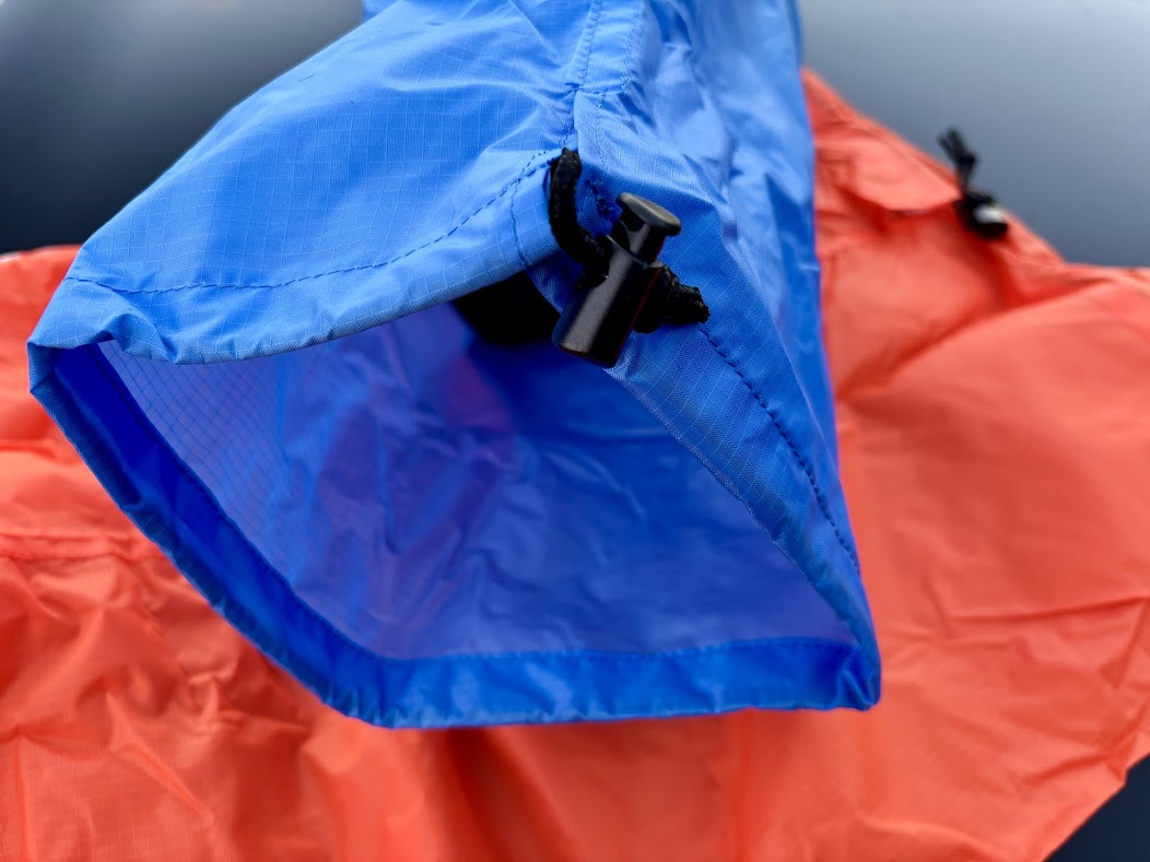 The top opening of the Hikeman compression bag uses a simple drawstring closure