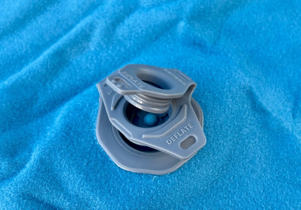 The Sea to Summit Aeros Ultralight Pillow comes with a multi-function valve that allows for quick inflation and deflation