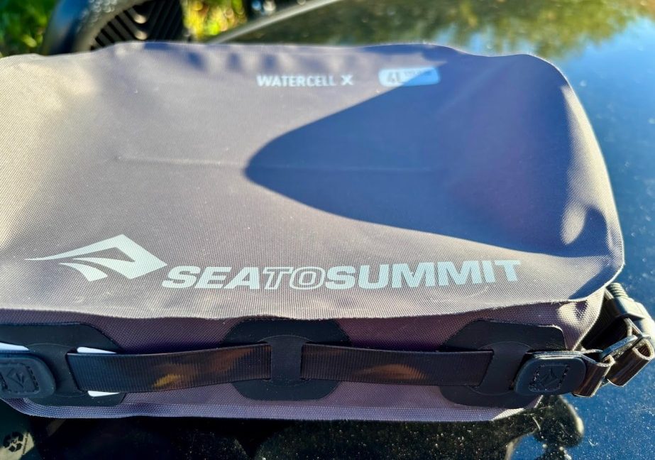 The adjustable TPU strap system on the Sea to Summit Watercell X 4L is great and allows you to lash the cell onto a pack, hang it or use it as a shoulder strap for carrying