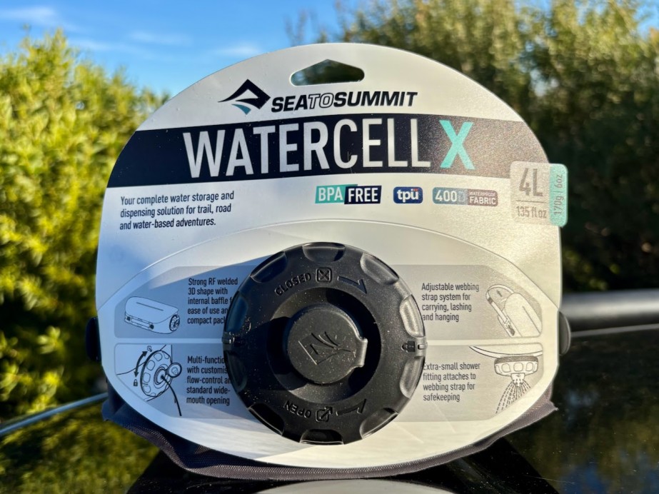 The cap system on the Sea to Summit Watercell X 4L has a standard wide-mouth opening for easy filling and a smaller multi-function low-profile cap nested underneath for flow control
