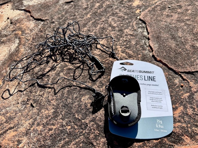 The clever part of the Sea to Summit clothesline is the dual cord setup and the rubber ‘beads’ that slide easily along the 3.5 meter cords