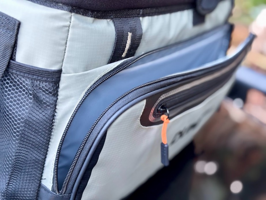 The exterior of the Dune cooler bag features an insulated front pocket for dry items like phones, keys, or bottle openers