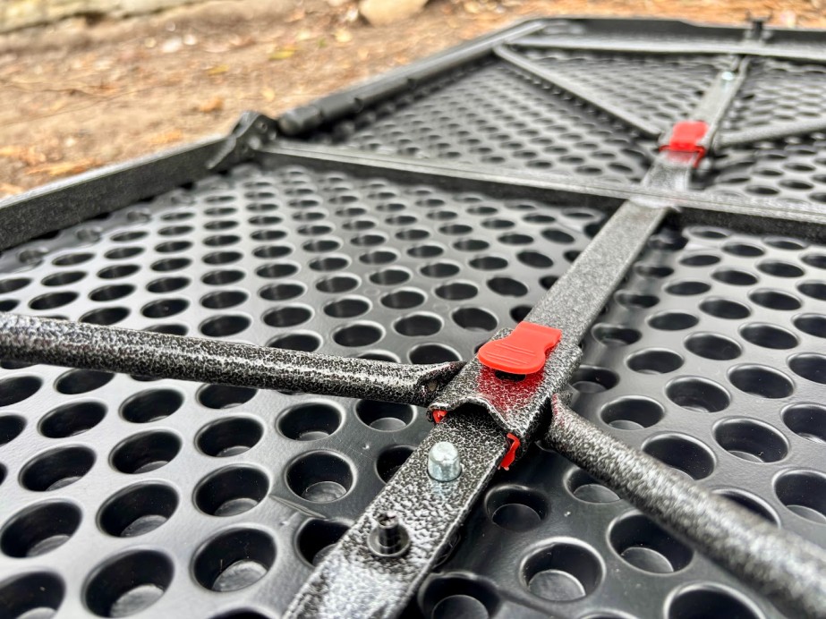 The locking mechanisms for the legs of the OZtrail Ironside Table feel sturdy with heavy-duty clips that snap firmly into place