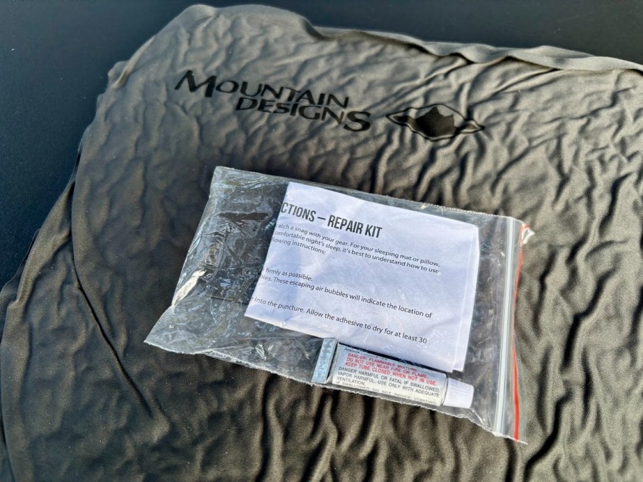 This Mountain Design inflatable pillow comes with a little repair kit which might come in handy on long off-grid trips