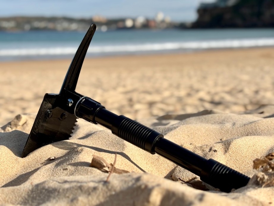 The Coleman folding shovel with pick is small and the handle length is fairly short when fully extended