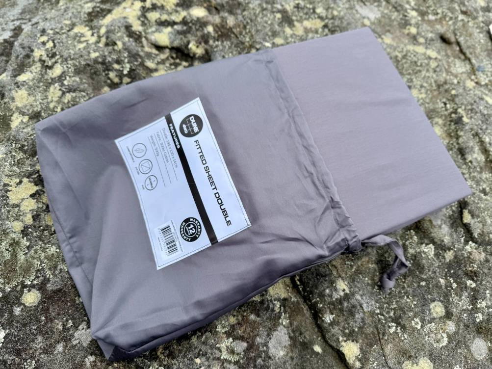 The Dune fitted sheet arrives neatly packed in its own little storage sack