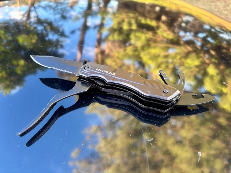 The Raxco knife multi tool also included a can opener, bottle opener, and needle-nose pliers including wire cutter