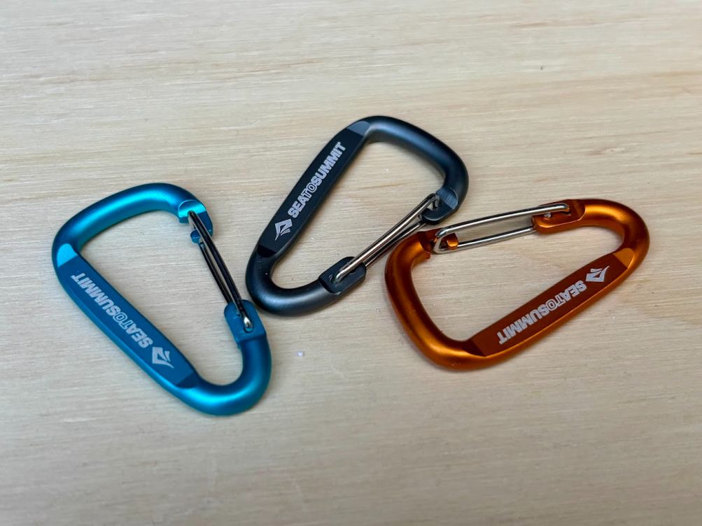 The colored small size of the Sea to Summit carabiners make them excellent for managing the tiny pieces of gear that usually get lost
