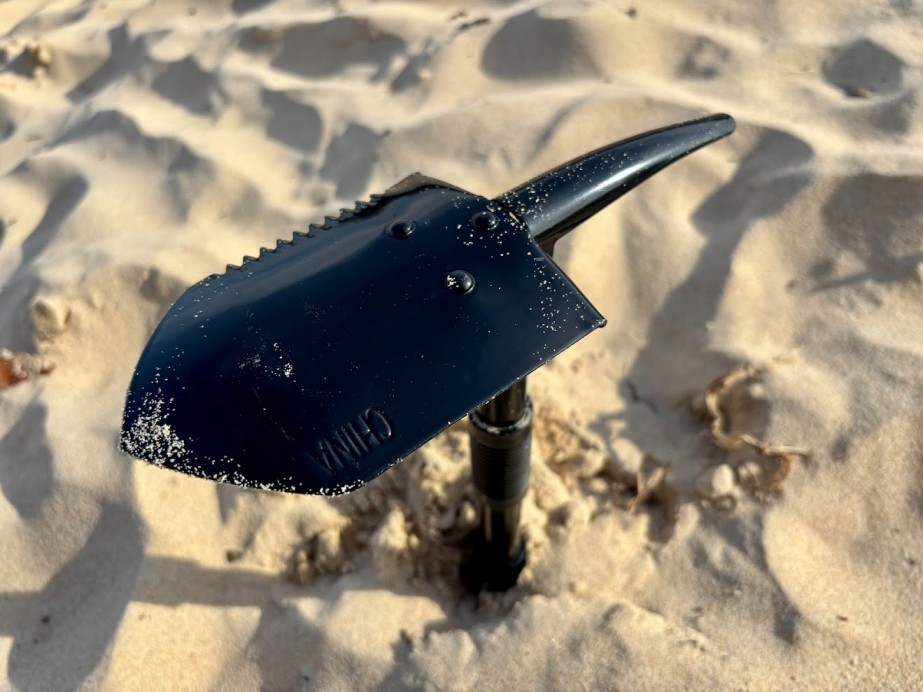 The dual function of the Coleman camping shovel as a pick is great for breaking up hard soil before you start shovelling