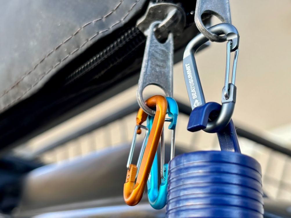 The stainless steel wire gate on the Sea to Summit carabiners is a key feature that provides a simple immediate closure